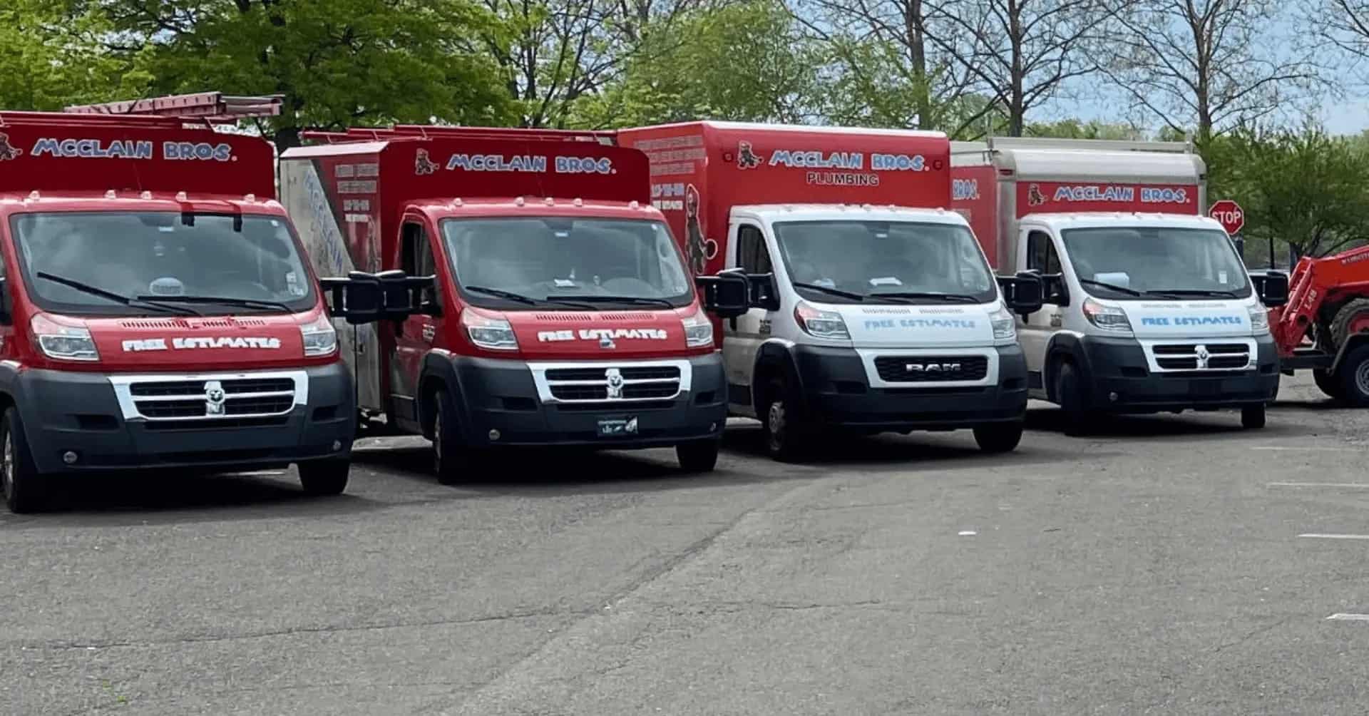 McClain Bros. trucks parked in a row